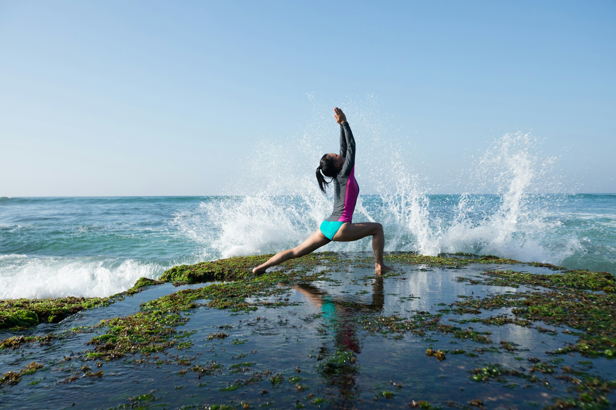 Powerful woman yoga on seaside